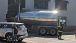 PHOTOS: Tanker truck slams into car collision center in Murrysville