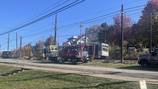 25 people evacuated after power line sparks fire on T rail car, officials say