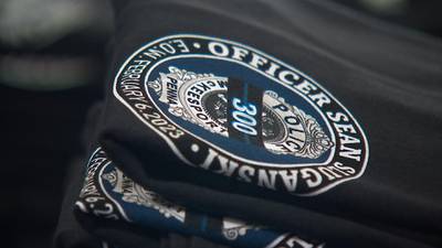 PHOTOS: Store in McKeesport selling t-shirts to raise money for family of Officer Sean Sluganski
