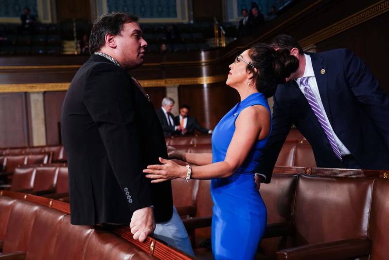 WASHINGTON, DC - MARCH 7:  Ousted Republican Rep. George Santos (L) of New York talks with U.S. Rep. Lauren Boebert (R-CO) ahead of the annual State of the Union address by President Joe Biden during a joint session of Congress in the House chamber at the Capital building on March 7, 2024 in Washington, DC. This is Biden's final address before the November general election.  (Photo by Shawn Thew-Pool/Getty Images)