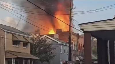 RAW: Flames tear through building in Sharpsburg