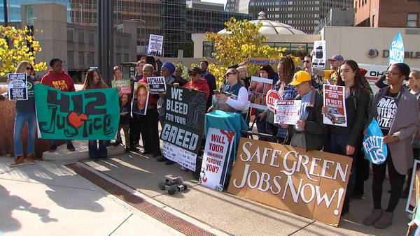 Environmental groups hold rally outside of industry conference
