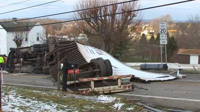 Photos: Tractor-trailer hits two houses, overturns on Fayette County road