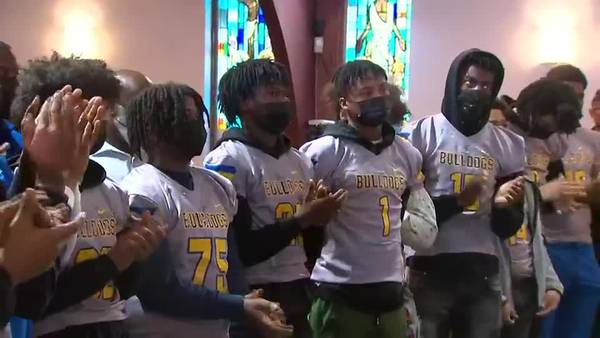 Community members kick off Super Bowl Sunday by honoring high school football team