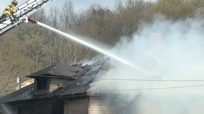 PHOTOS: Fire tears through Fayette County home