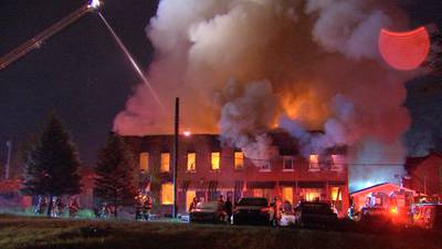 PHOTOS: Fire rips through rowhomes in Braddock, causing part of building to collapse
