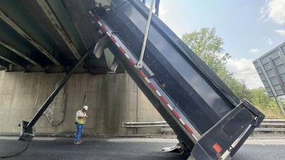 PHOTOS: Truck hits overpass, shuts down multiple Washington County roads