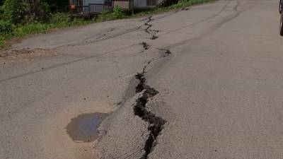 Neighbors in Elliott concerned about cracked, crumbling road