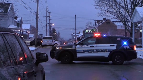 PHOTOS: Large police presence at Uniontown home where woman was found dead