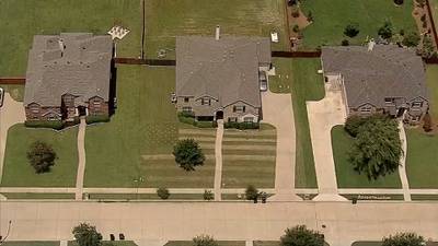 Teen mows American flag design into yard to honor fallen soldier ahead of July 4th holiday