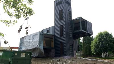 Couple builds homemade of shipping containers