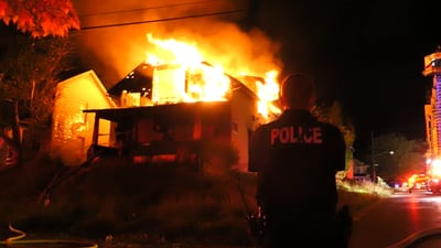 PHOTOS: Massive flames tear through house in New Castle