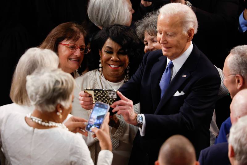 WASHINGTON, DC - MARCH 07: U.S. President Joe Biden takes a photo with members of Congress as he arrives to deliver the State of the Union address during a joint meeting of Congress in the House chamber at the U.S. Capitol on March 07, 2024 in Washington, DC. This is Biden’s last State of the Union address before the general election this coming November. (Photo by Chip Somodevilla/Getty Images)
