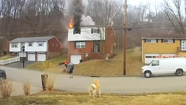Only on 11: Video shows man who was delivering meals running into burning home, saving man
