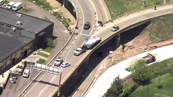 Truck towing swimming pool gets stuck on Highland Park Bridge