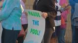 Group rallies in opposition to Green Tree’s plan for new swimming pool