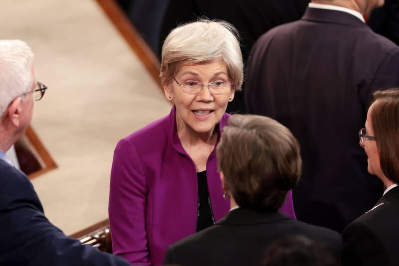 WASHINGTON, DC - MARCH 07: U.S. Sen. Elizabeth Warren (D-MA) talks to fellow members of Congress prior to the start of President Joe Biden's State of the Union address during a joint meeting of Congress in the House chamber at the U.S. Capitol on March 07, 2024 in Washington, DC. This is Biden’s last State of the Union address before the general election this coming November. (Photo by Win McNamee/Getty Images)