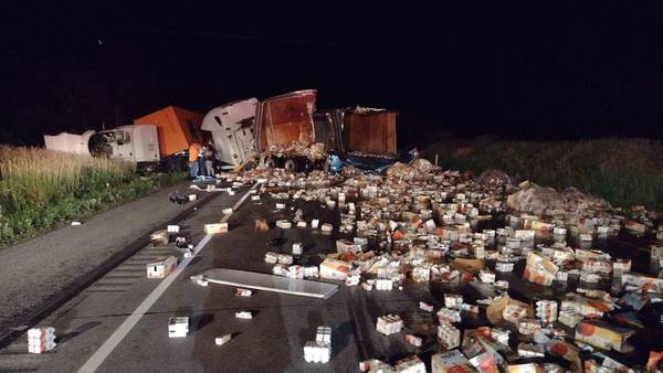 Boxes of juice spill onto I-80 after three tractor-trailers crash