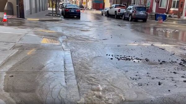 ‘The road looked like the river’: Water main break causes road to buckle in Uptown