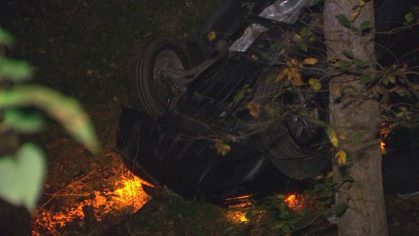 PHOTOS: 1 person injured after car rolls down hill, onto its roof in Penn Hills