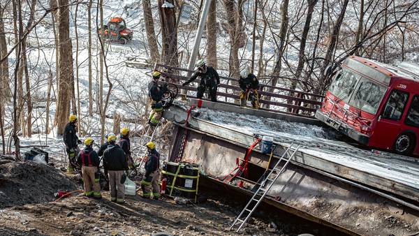 NEW PHOTOS: A look at the bridge collapse through the eyes of the first responders