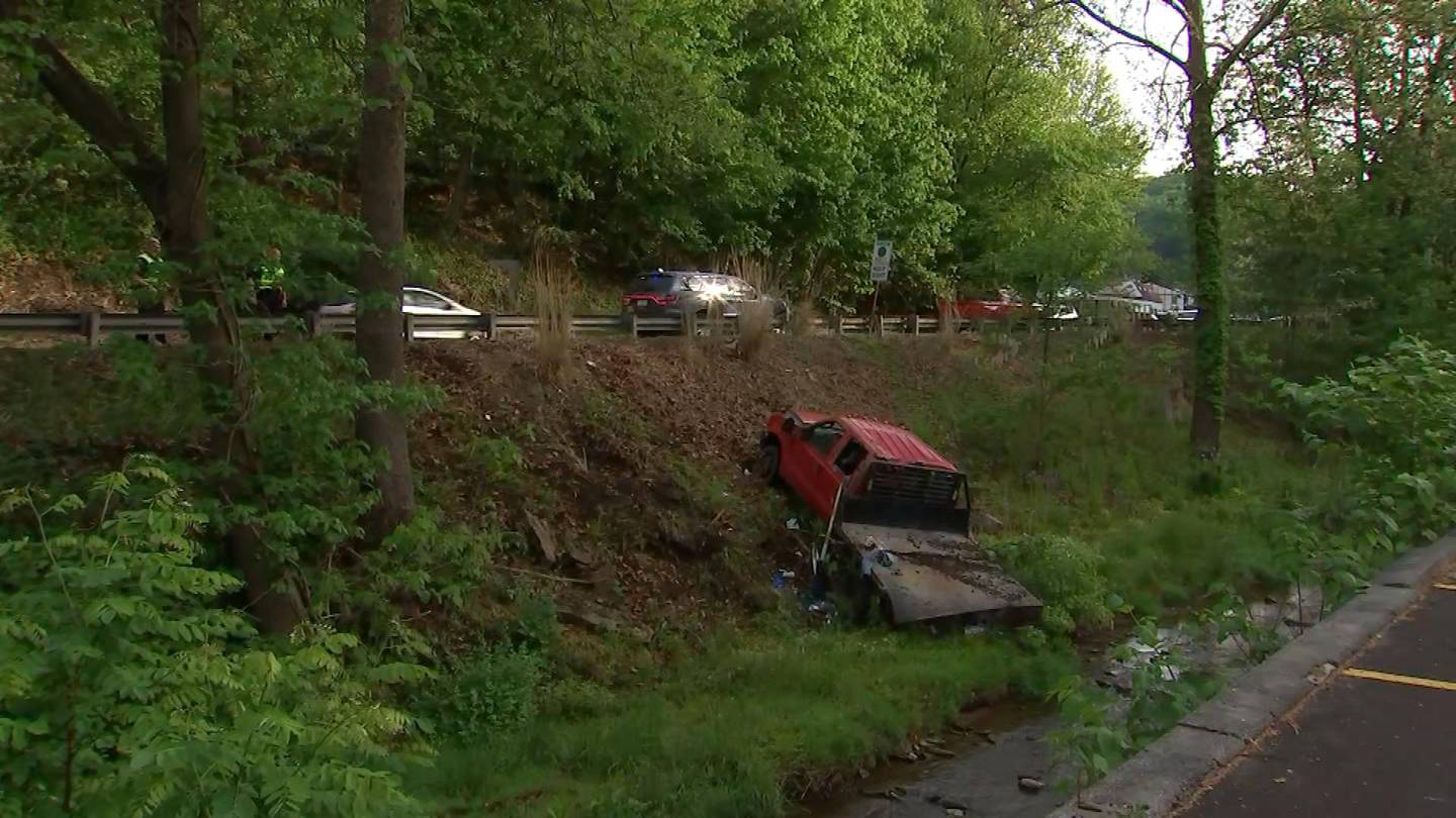 Truck goes over embankment along Route 8