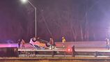 Vehicle rolls onto its roof on I-279, 2 people hospitalized