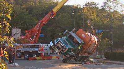 PHOTOS: Cement truck knocked on side after crash in Hazelwood