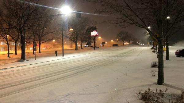 Snow still coming down, sticking to roadways across our area