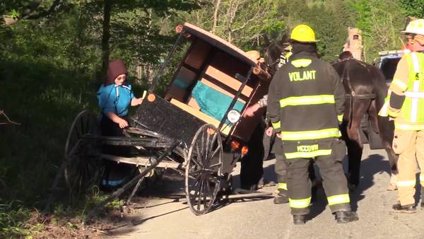 An Amish buggy flipped on its side after collision with vehicle