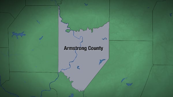 Woman dead after car hits bank and rolls over in Armstrong County