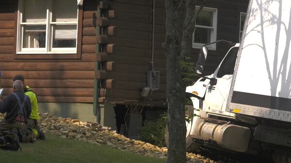 PHOTOS: Box truck crashes into Penn Township home