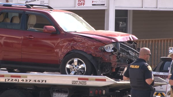 Police chase in Uniontown ends with suspect’s vehicle crashing into Meals on Wheels van, fence