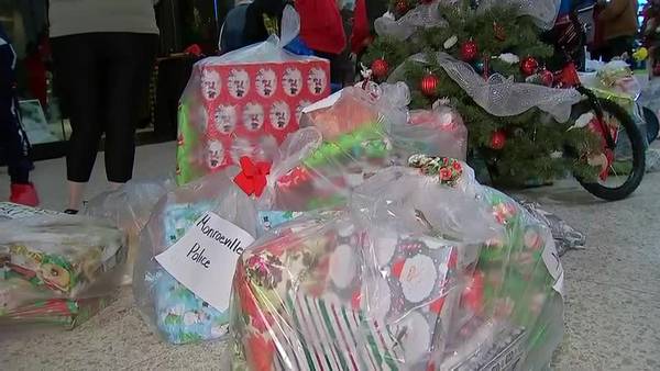 Police from nearly 50 local departments gather to donate toys for holidays