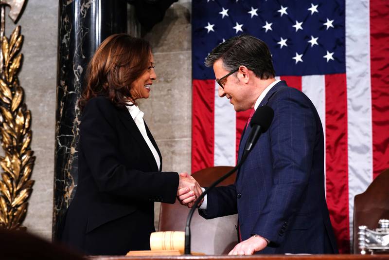 WASHINGTON, DC - MARCH 7: U.S. House Speaker Mike Johnson (R-LA) and Vice President Kamala Harris shake hands ahead of the annual State of the Union address by President Joe Biden before a joint session of Congress in the House chamber at the Capital building on March 7, 2024 in Washington, DC. This is Biden's final address before the November general election.  (Photo by Shawn Thew-Pool/Getty Images)