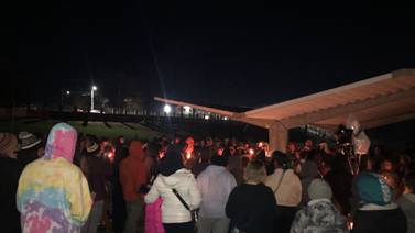 Friends, family hold vigil for high school student who died after a shooting in Monessen