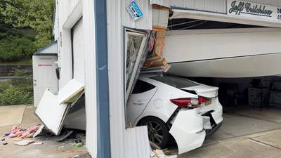 PHOTOS: Vehicle crashes into garage in Shaler Township