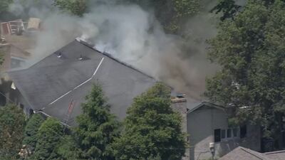 PHOTOS: Smoke billows into air from house fire in Ross Township
