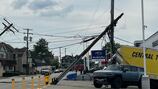 Busy Washington road remains closed after tractor-trailer crash knocks down poles, power lines