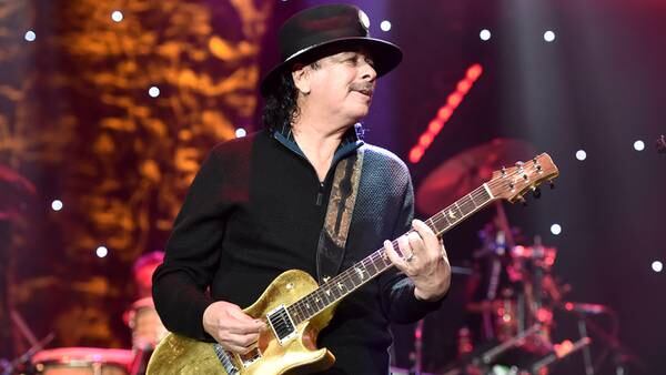 Carlos Santana collapses mid-concert from heat exhaustion, dehydration