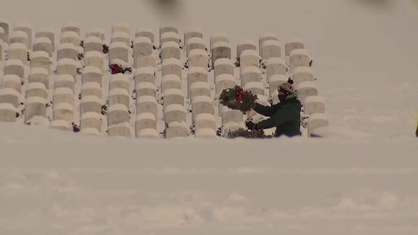 Volunteers gather in cold temperatures to clean National Cemetery of the Alleghenies