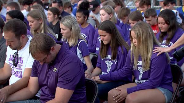 PHOTOS: Karns City community holds vigil to support high school quarterback who collapsed during game