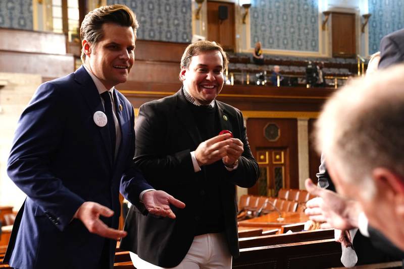 WASHINGTON, DC - MARCH 7:  U.S. Rep. Matt Gaetz (R-FL) (L) talks with ousted Republican Rep. George Santos of New York ahead of the annual State of the Union address by President Joe Biden during a joint session of Congress in the House chamber at the Capital building on March 7, 2024 in Washington, DC. This is Biden's final address before the November general election.  (Photo by Shawn Thew-Pool/Getty Images)
