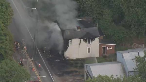 PHOTOS: Smoke billows into air from house fire in Oakmont