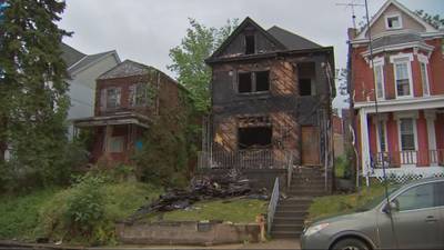 Woman accused of starting house fire in Knoxville that injured 2 firefighters