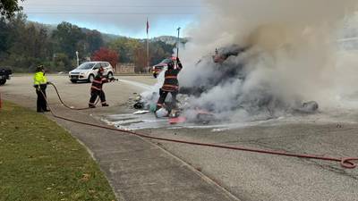 PHOTOS: Truck dumps trash on fire in Washington County