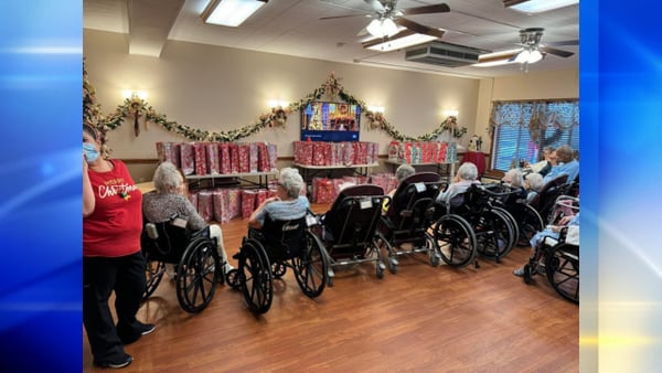 New Castle police officers visit local nursing homes, give holiday gifts to residents