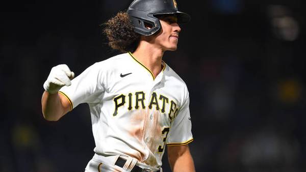 Tucker uses glove, bat to lift Pirates over Reds 9-2