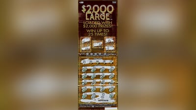 Woman picking up pizza for dinner wins $2M playing lottery