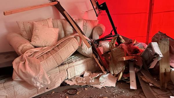 PHOTOS: Greensburg family looking for information on car that crashed into living room